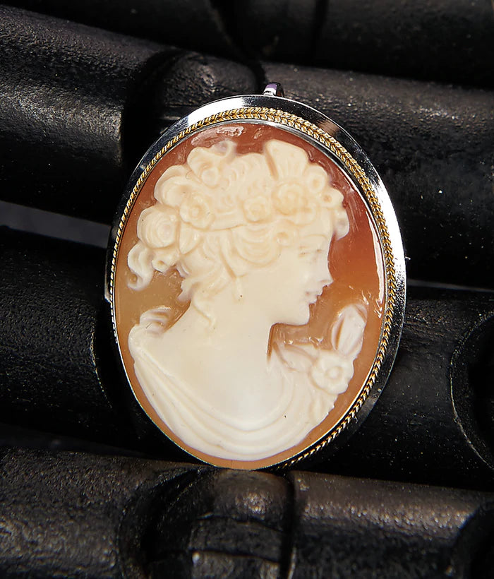 The Face in The Cameo, An Antique Doll Auction